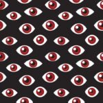 a pattern of red eyes on a darkened background