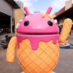 The Google Android logo and mascot, known as Bugdroid by the community, is being displayed as a statue resembling a strawberry ice-cream cone on Android Avenue at the Mobile World Congress 2024 in Barcelona, Spain, on March 25, 2024.