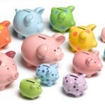 array of colorful piggy banks