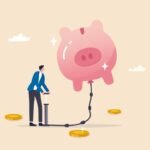 pumping air into a floating piggy bank