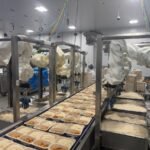 Chef robots deposit rice at Chef Bombay