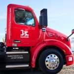 Cab of red Peterbilt semi truck