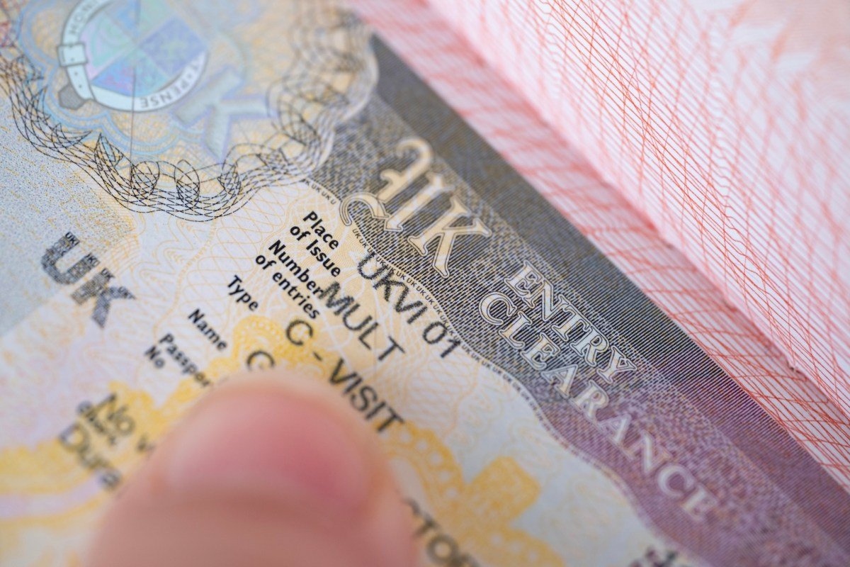 a close-up shot of a UK visa in someone's passport.