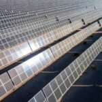 Rows of solar panels face the sunlight in Nevada.