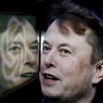 In this photo illustration, the logo of 'OpenAI' is displayed on a mobile phone screen in front of a computer screen displaying the photograph of Elon Musk.