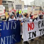 'Tire as mãos do nosso NHS': Protestos anti-Palantir eclodem no Reino Unido por causa de acordo com o Serviço Nacional de Saúde