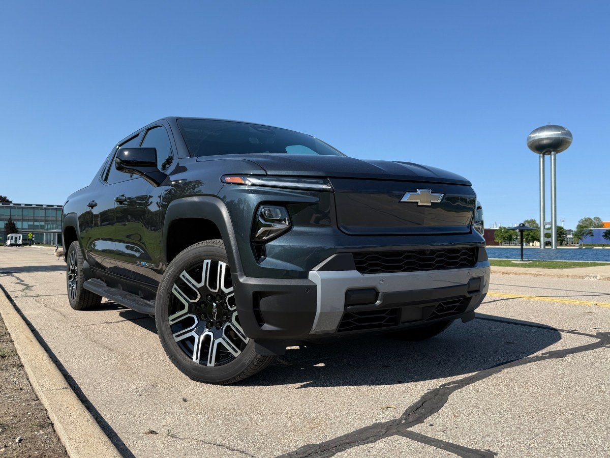 A Silverado EV stands with its front wheels turned.