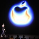 Apple CEO Tim Cook attends a product launch event.