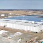 An aerial view of a battery factory under construction.